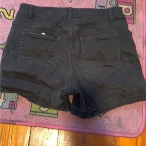 Black shorts with rips